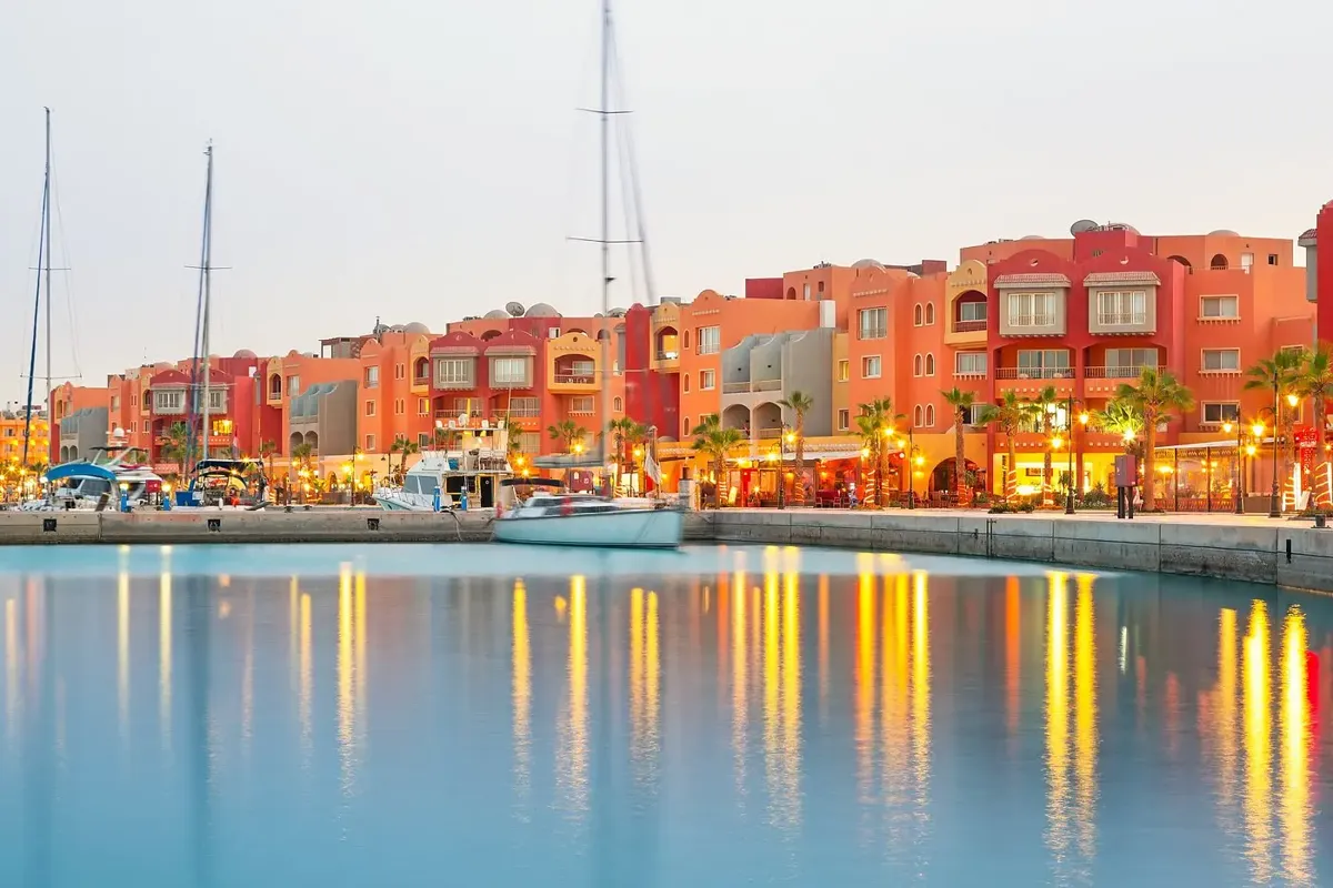 Boats and waterfront cafés along Hurghada Marina Boulevard